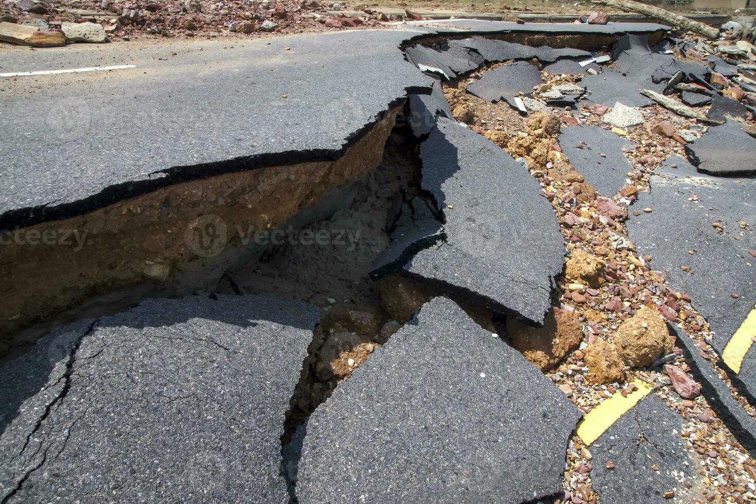 Road erosion caused by waves and severe storms. photo