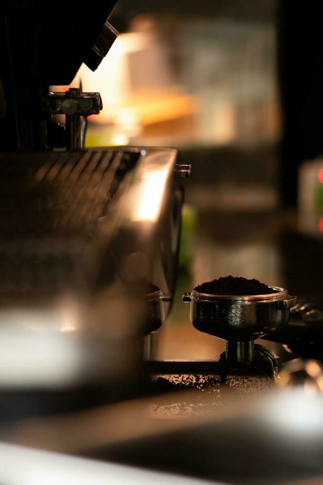 make of coffee with coffee machine on blur coffee shop background photo