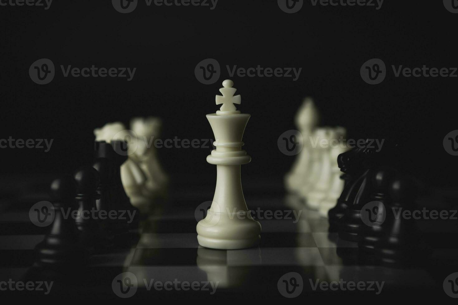 Pieces on chess board for playing game and strategy. photo