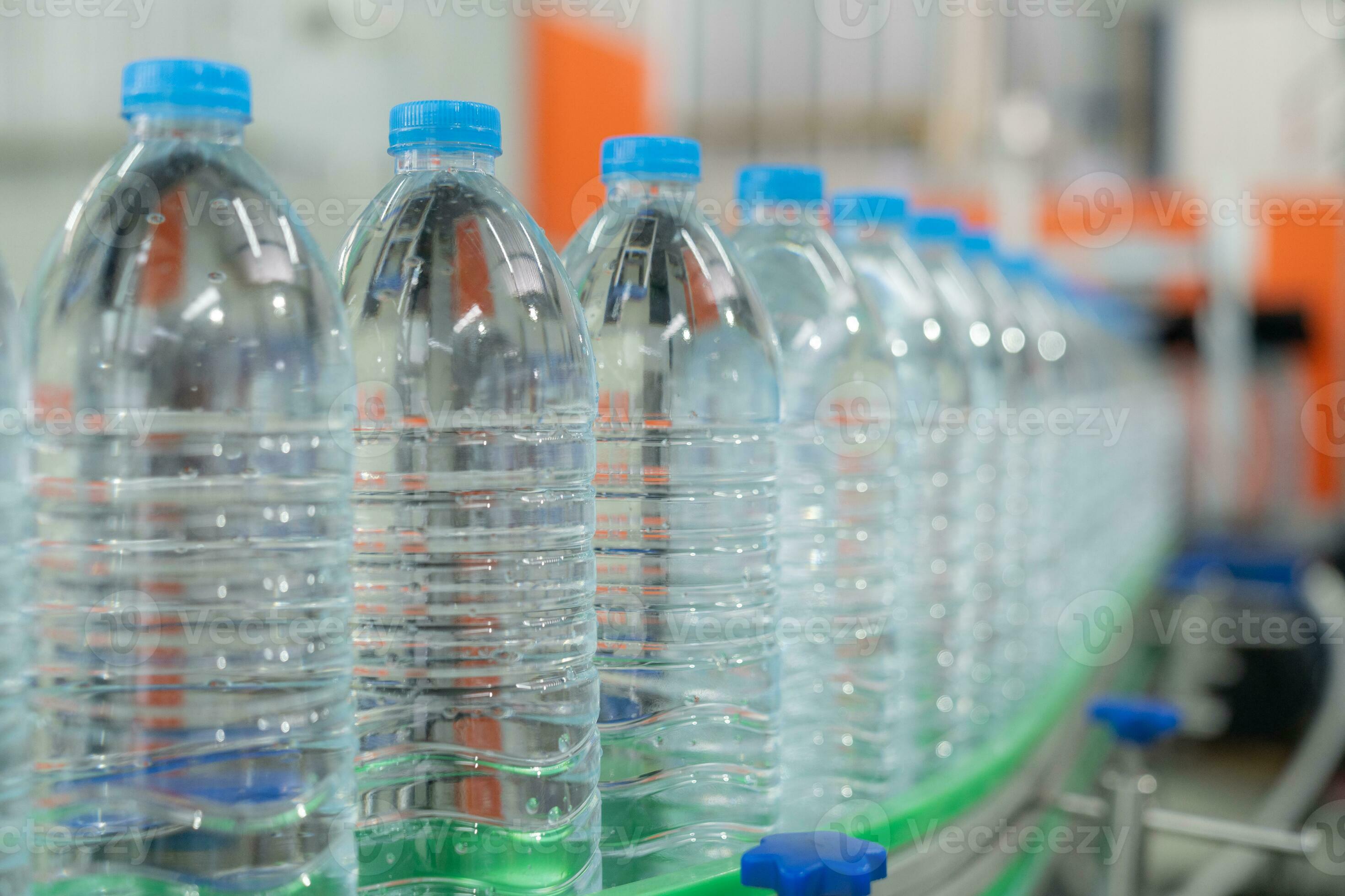 Closeup on mineral water bottles in raw and lines 35375196 Stock Photo