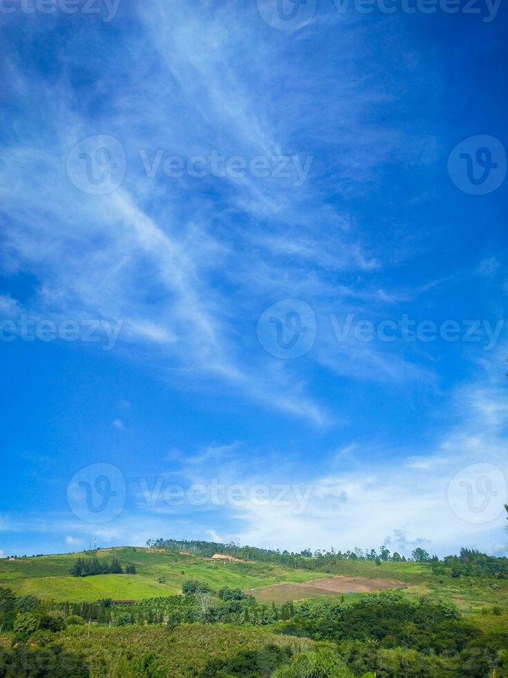 Beautiful landscape of mountain and blue sky with cloud in Indonesia photo