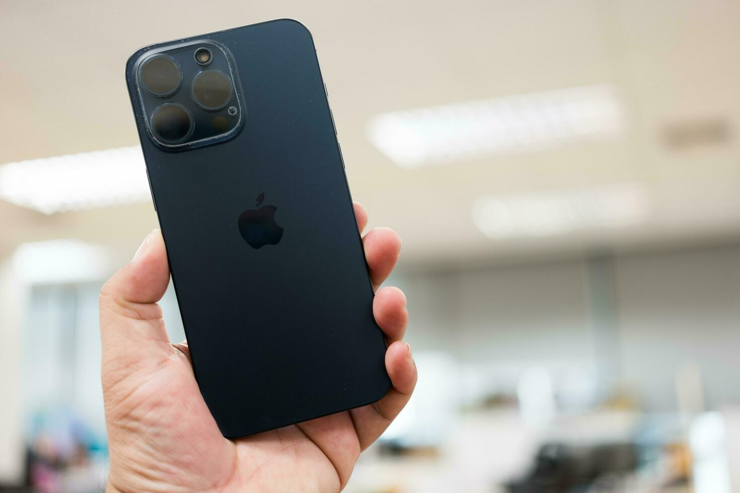 Bangkok, Thailand - December 5, 2023 The latest iPhone 15 Pro Max blue Titanium featuring a 120mm lens. photo
