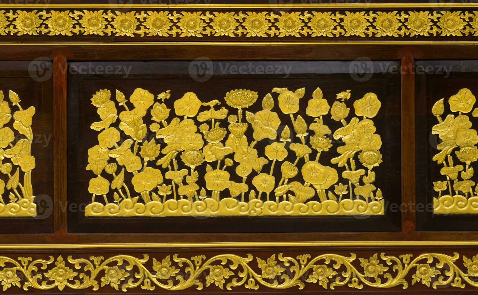 Pattern of wood carve gold paint for decoration photo