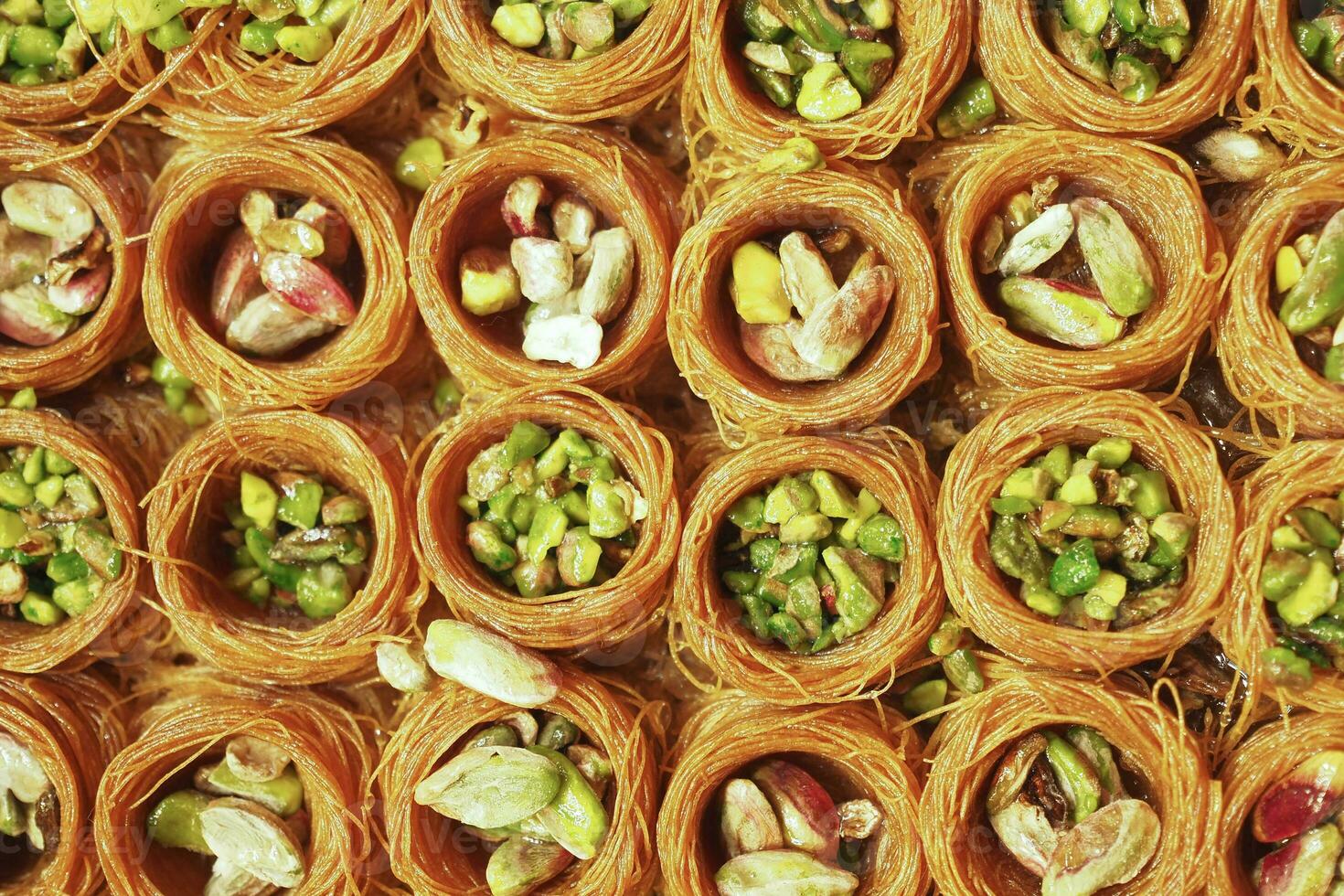 handmade turkish dessert baklava on table photo
