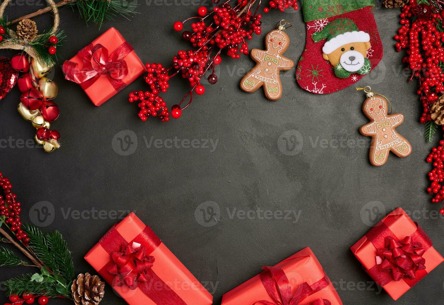 Christmas decor, gift red boxes on a black background, top view. photo