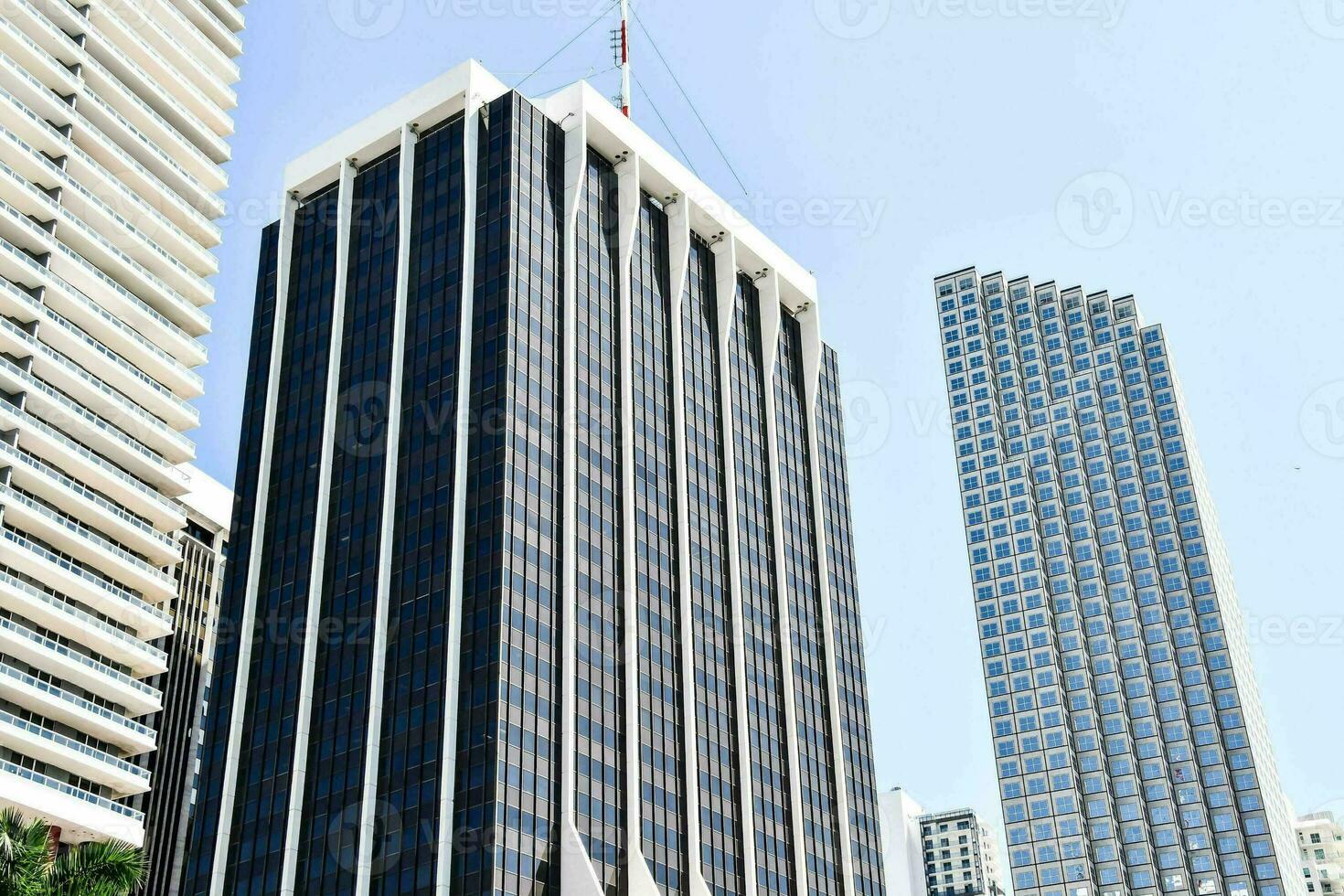 the building is tall and has a lot of windows photo