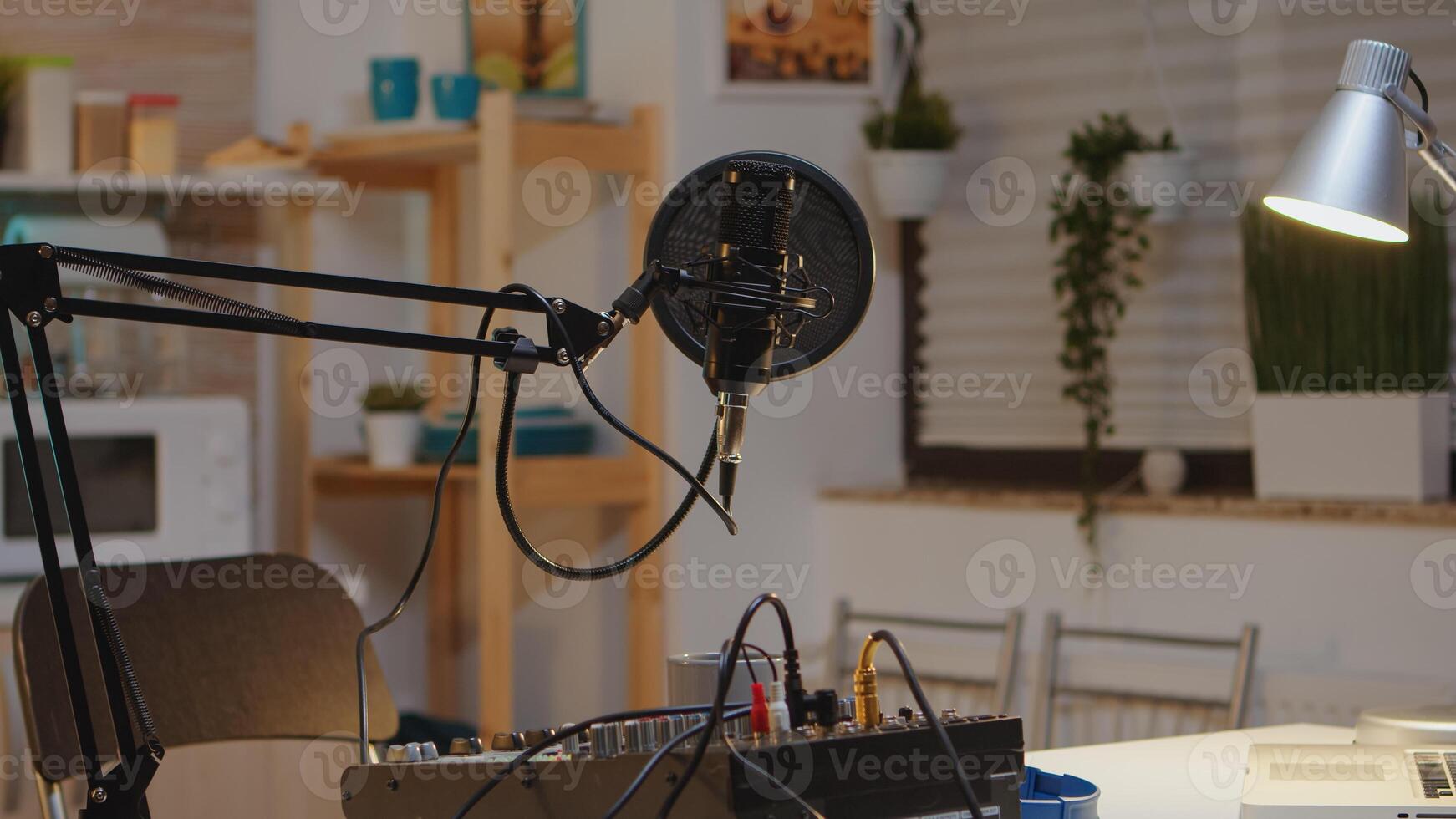 Microphone and mixer for podcast of famous influencer. Recording social media content with production microphone. Digital web internet streaming station photo