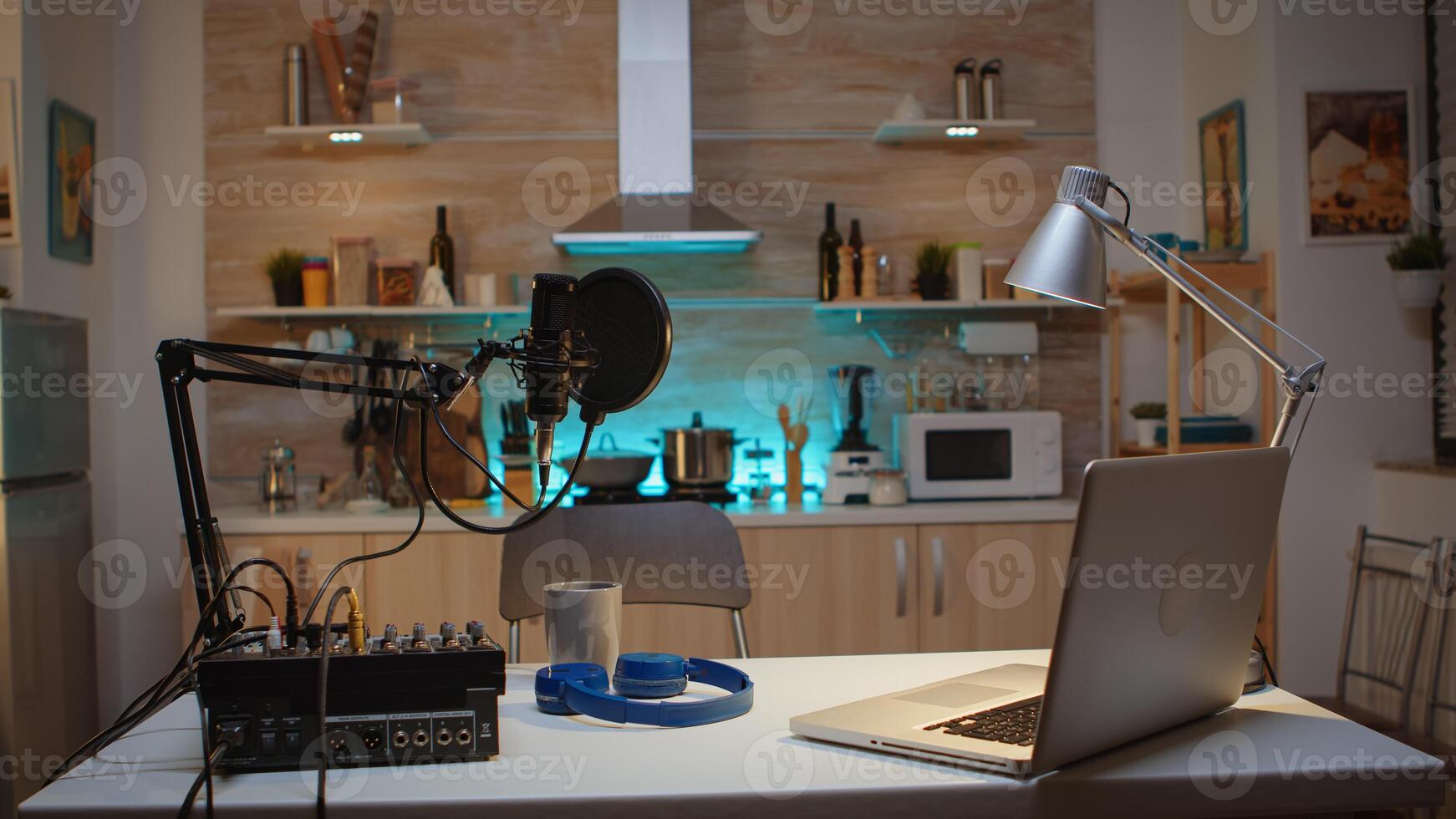 Station for recording and speaking during podcast. Influencer recording social media content with production microphone. Digital web internet streaming station photo