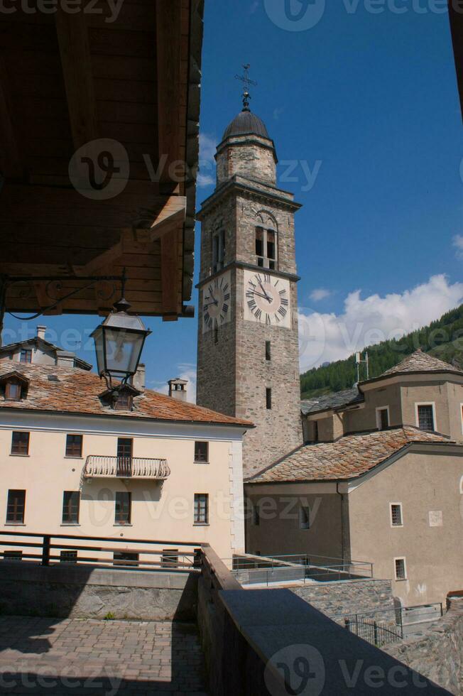 a large building with a clock tower photo