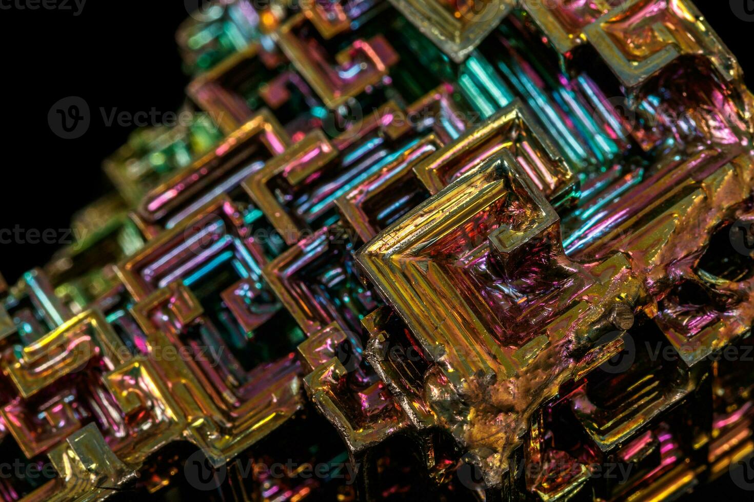 Macro of the stone bismuth mineral on a black background photo