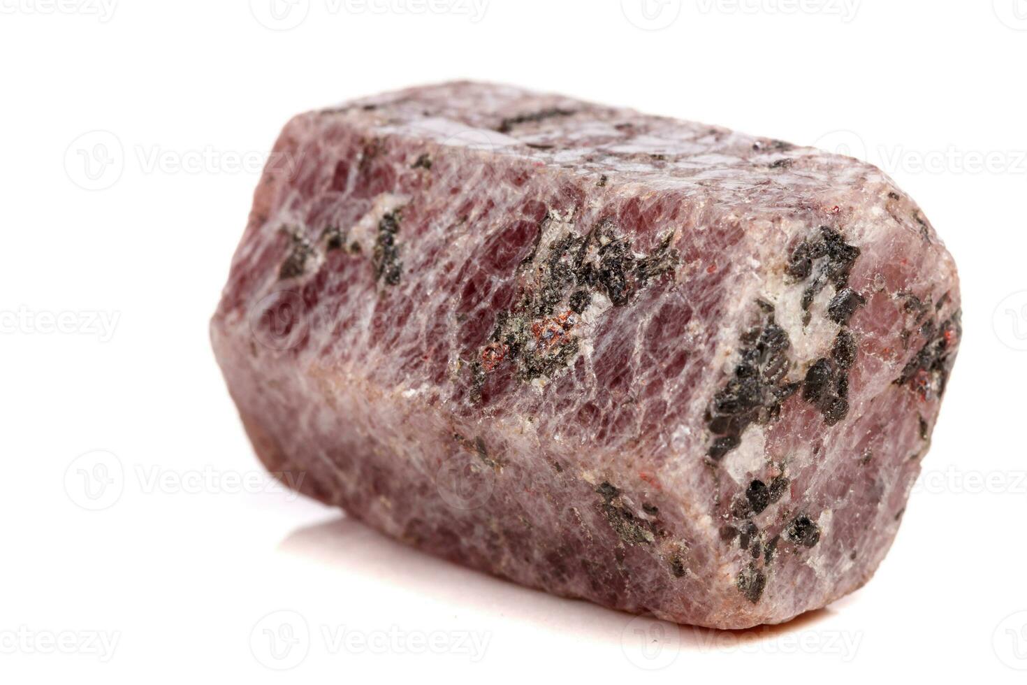 Macro mineral stone Ruby in the breed a white background photo