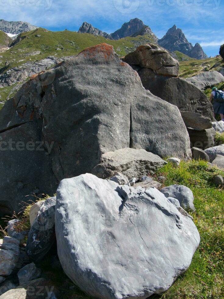 a large rock in the foreground photo