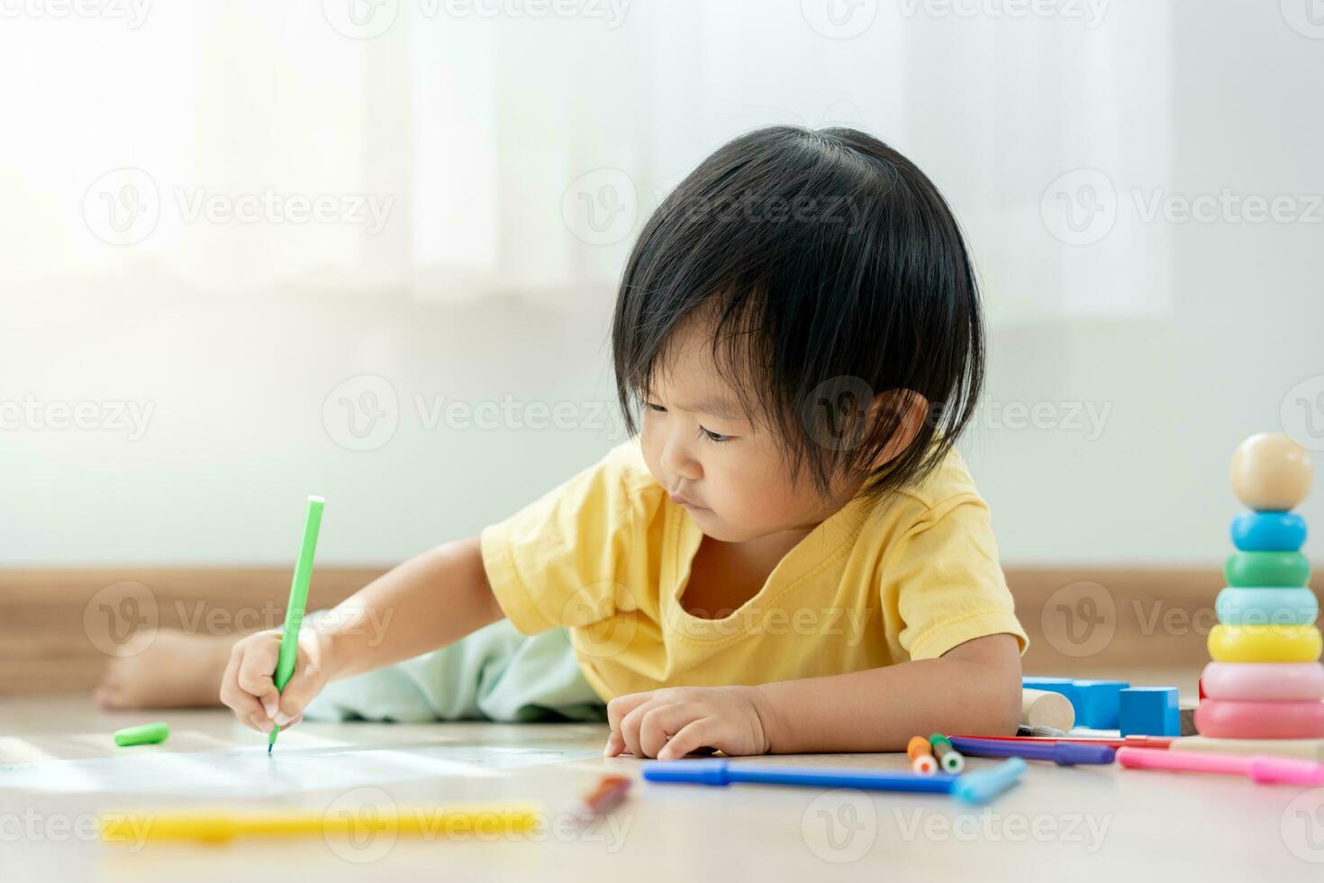 Happy Asia children playing learning paint on paper. Activity, development, IQ, EQ, meditation, brain, muscles, essential skills, family having fun spending time together. Holiday photo