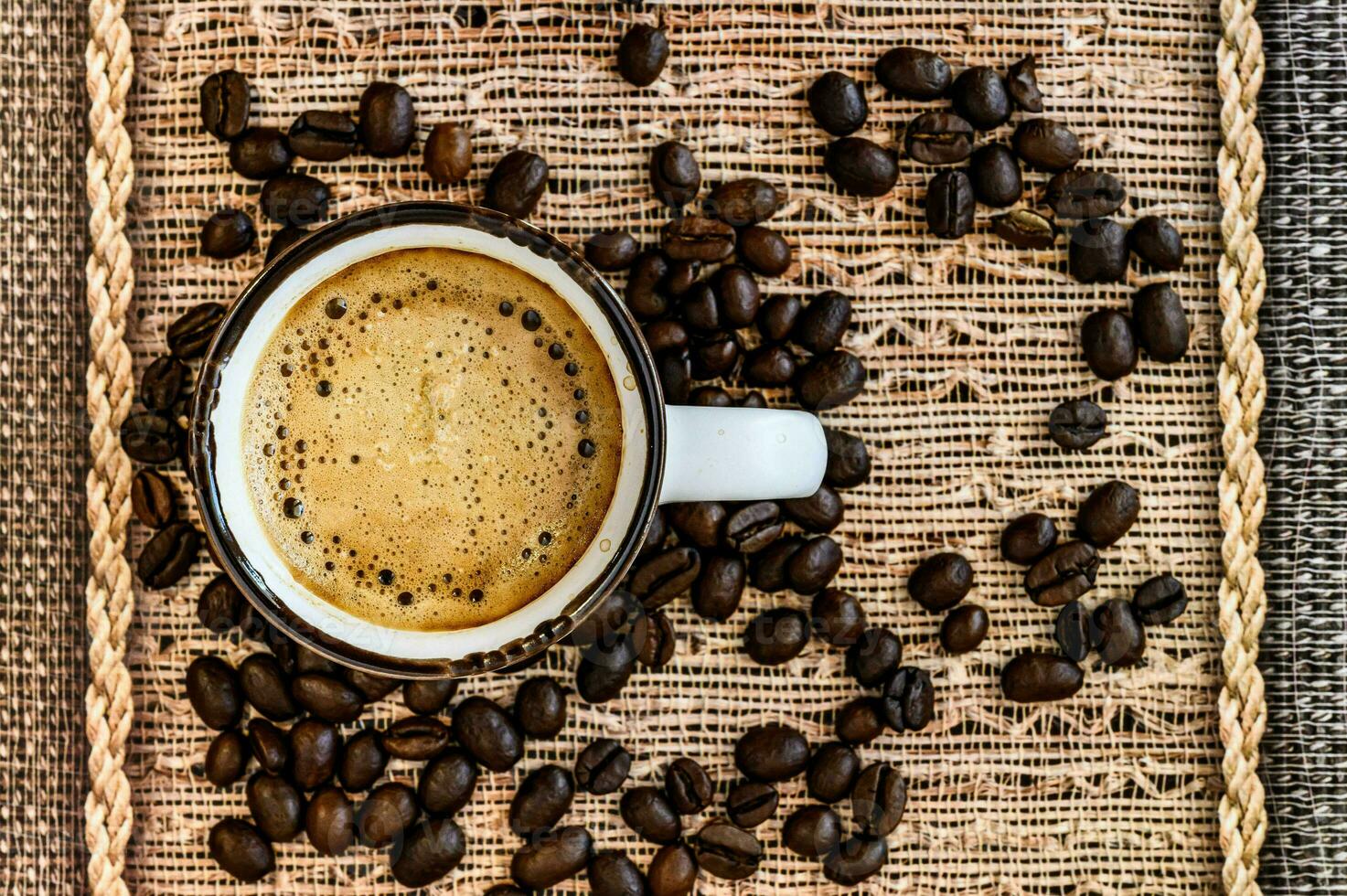Fresh hot coffee on a wooden tray photo