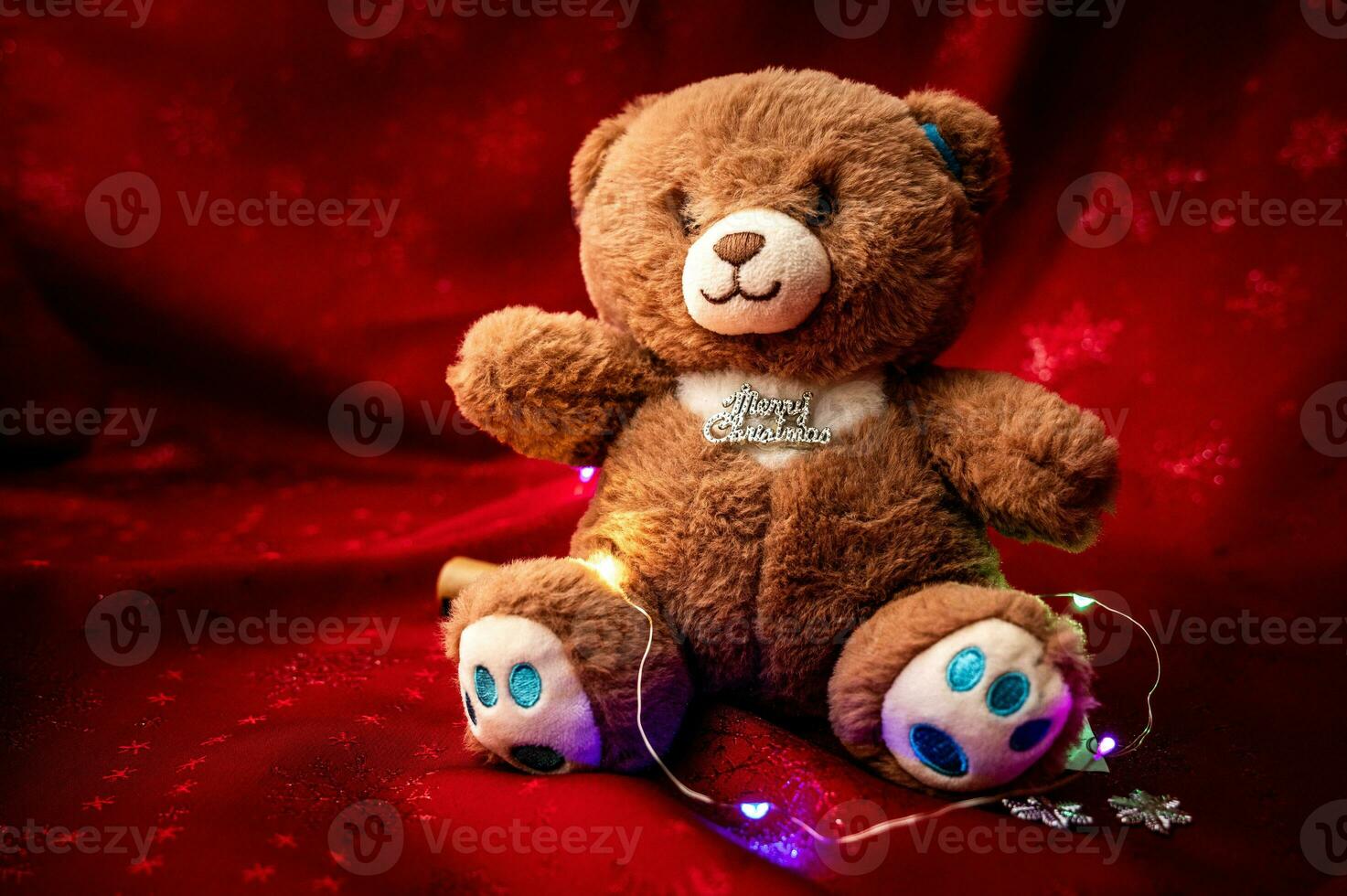 Gift and bear christmas dall decoration red color tone. photo