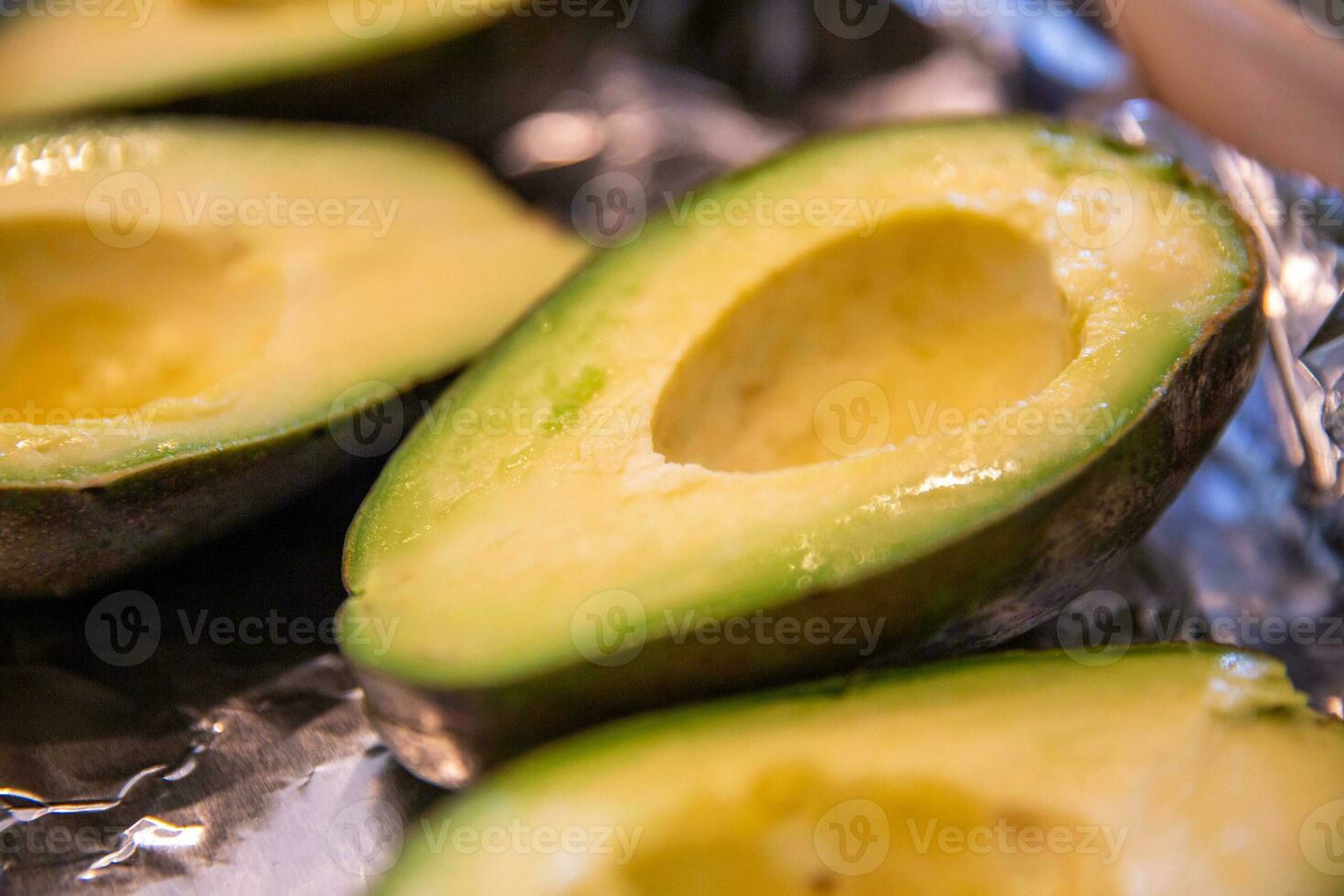Sliced half of avocado photo