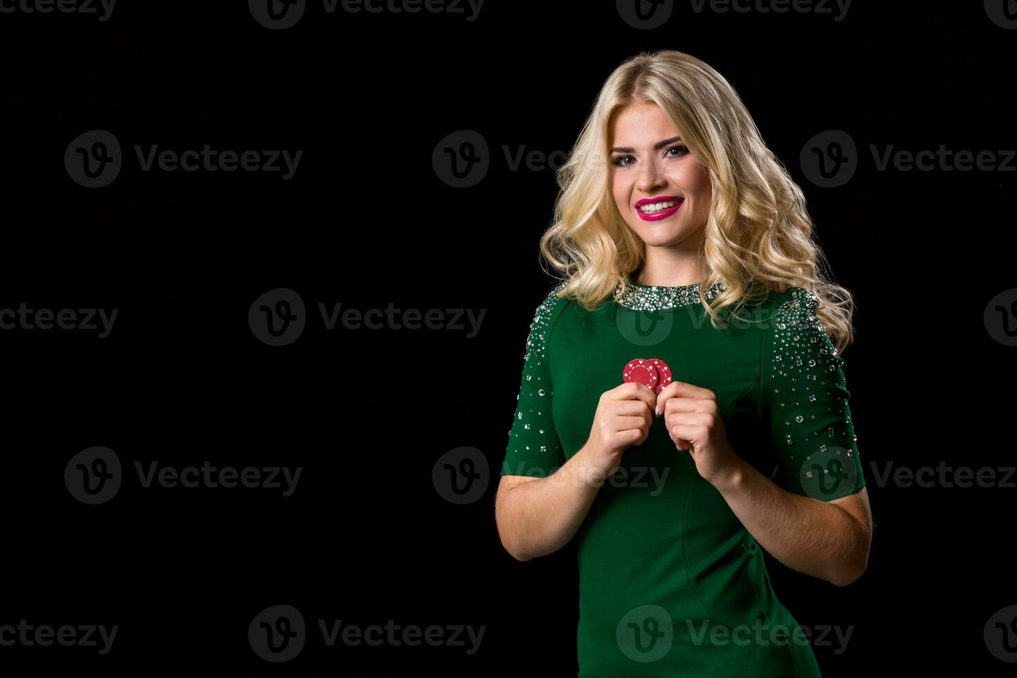 blonde woman posing with chips for gambling photo