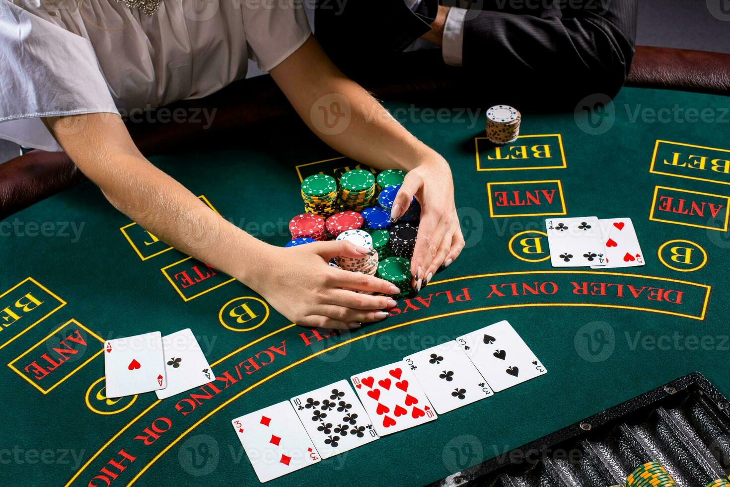 couple playing poker at the table photo