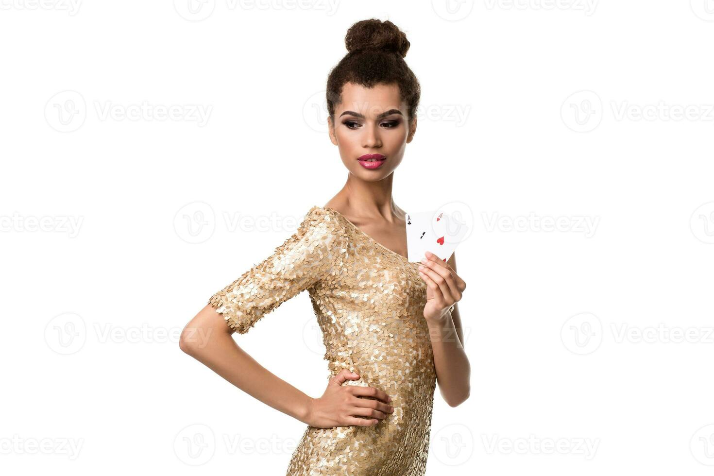 Pretty african girl shows two aces in casino poker and win photo