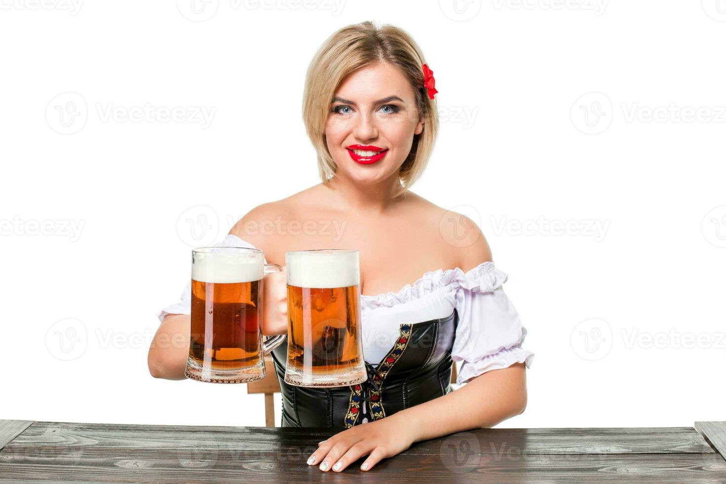 Beautiful young blond girl of oktoberfest beer stein photo