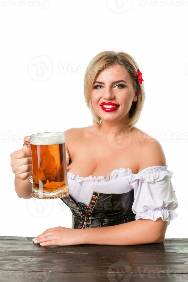 Beautiful young blond girl of oktoberfest beer stein photo