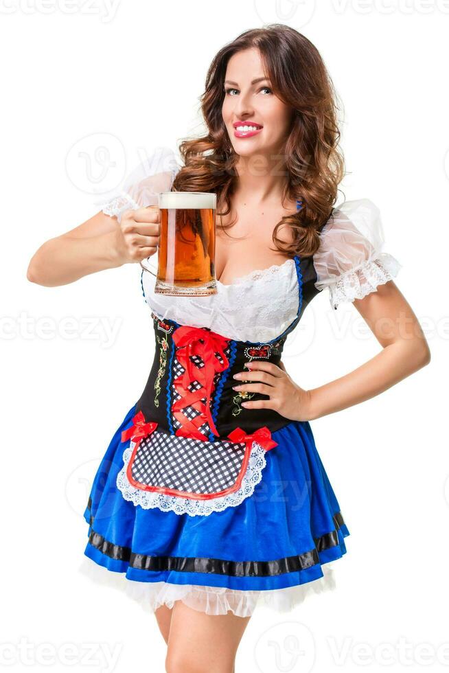 Beautiful young brunette girl of oktoberfest beer stein photo