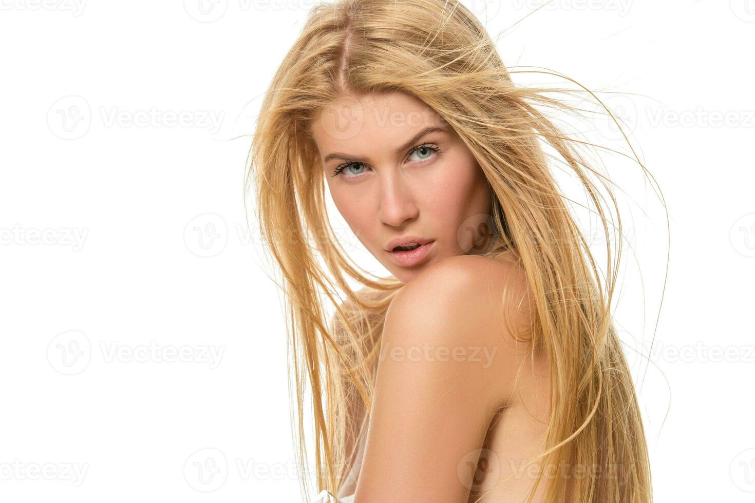 Young attractive blond woman with blue eyes photo