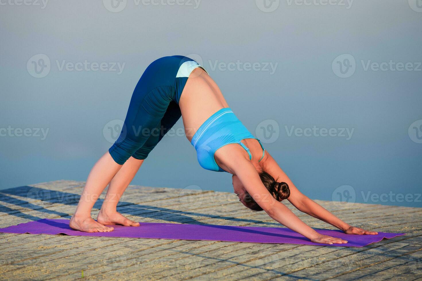 girl doing yoga exercise photo