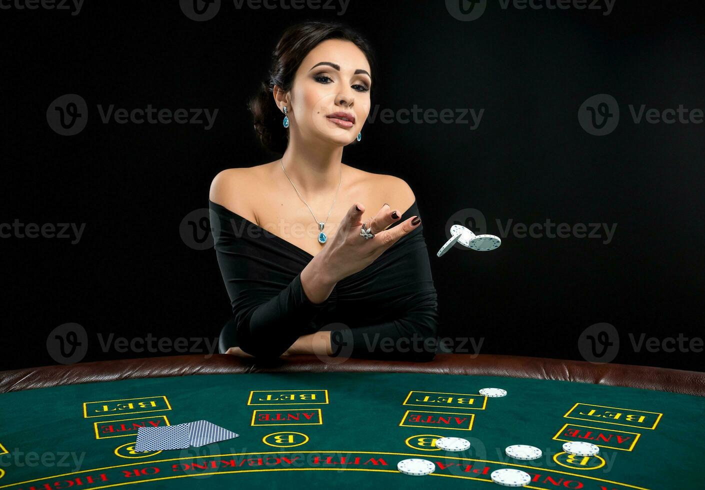 sexy woman with poker cards and chips photo