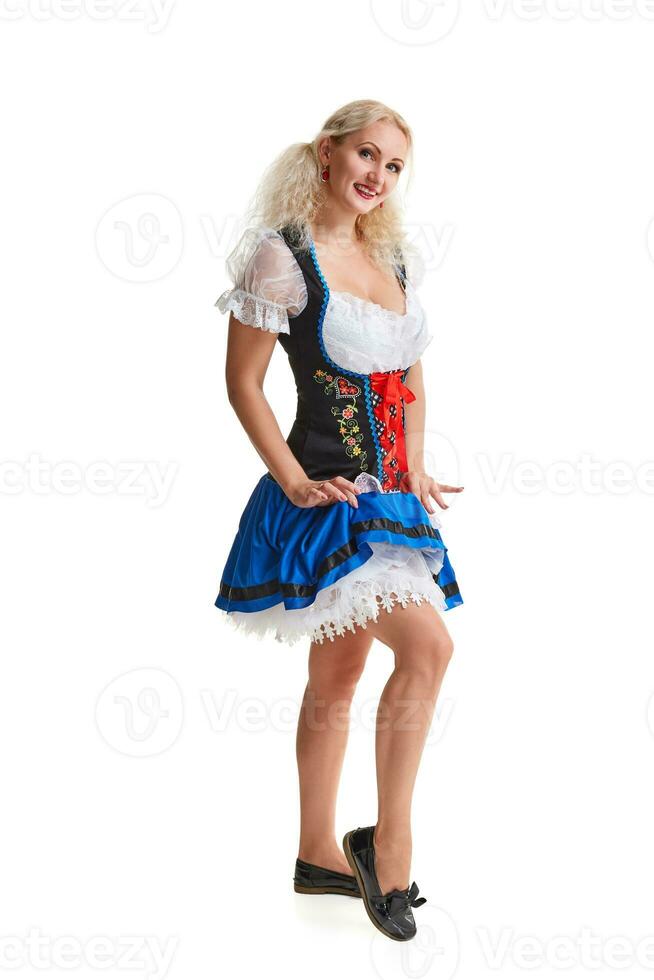 Beautiful young blond girl of oktoberfest beer stein photo