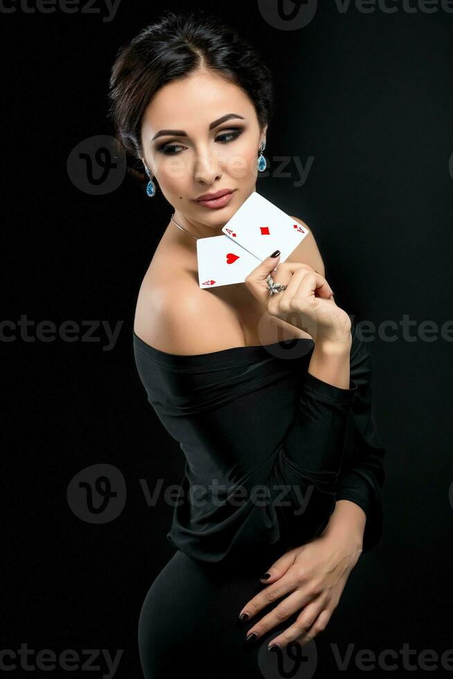 sexy woman with poker cards photo