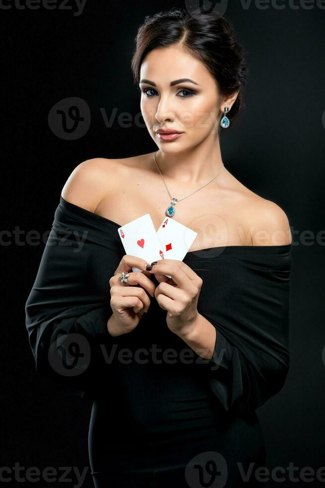 sexy woman with poker cards photo