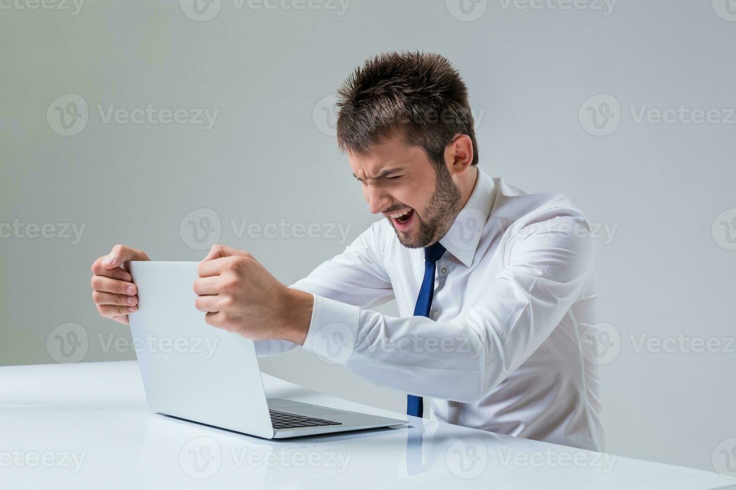 emotional man and laptop photo
