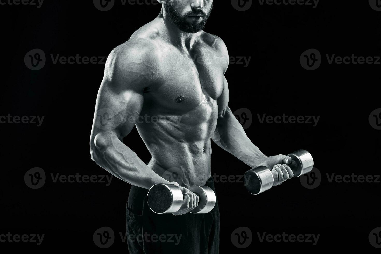 Muscular bodybuilder guy doing posing photo