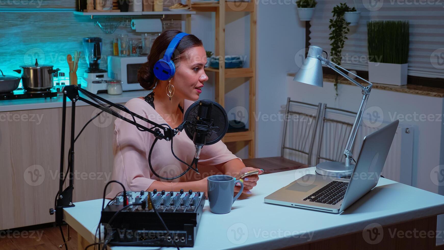 Vlogger looking at laptop while asking her audience to subscribe on her channel. Creative online show Onair production internet broadcast host streaming live content, recording digital social media communication photo