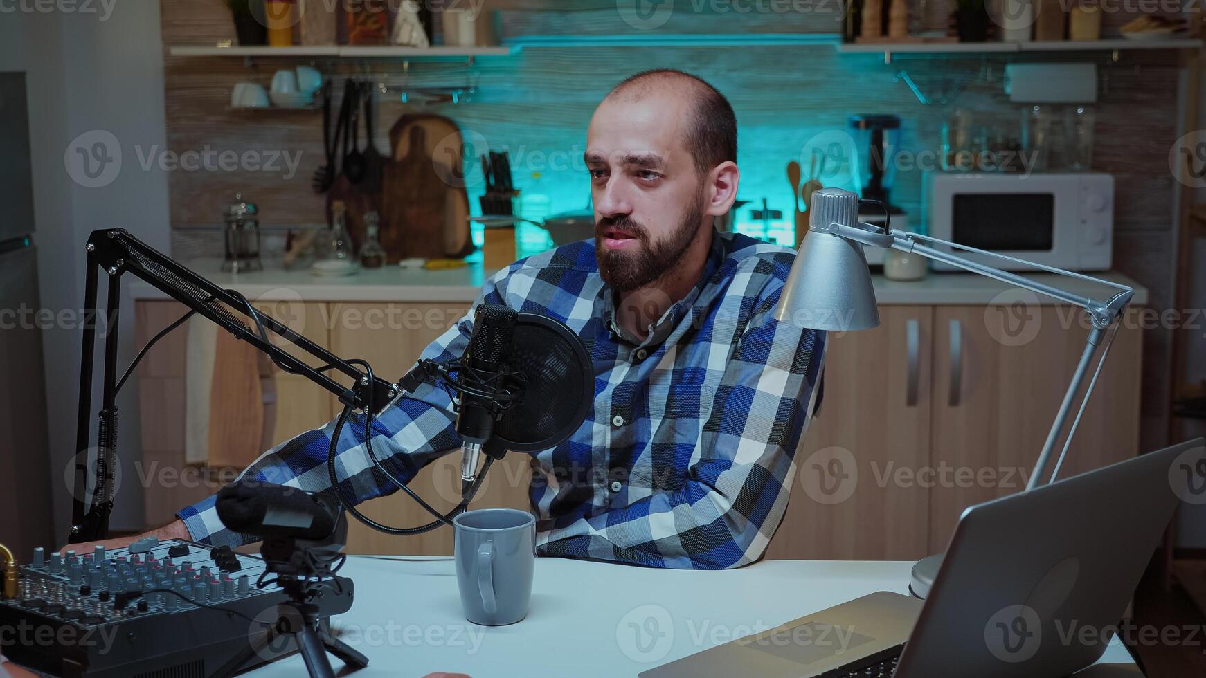 Successful bloggers talking during podcast using professional recording gear. Creative online show Onair production internet broadcast host streaming live content, recording digital social media communication photo