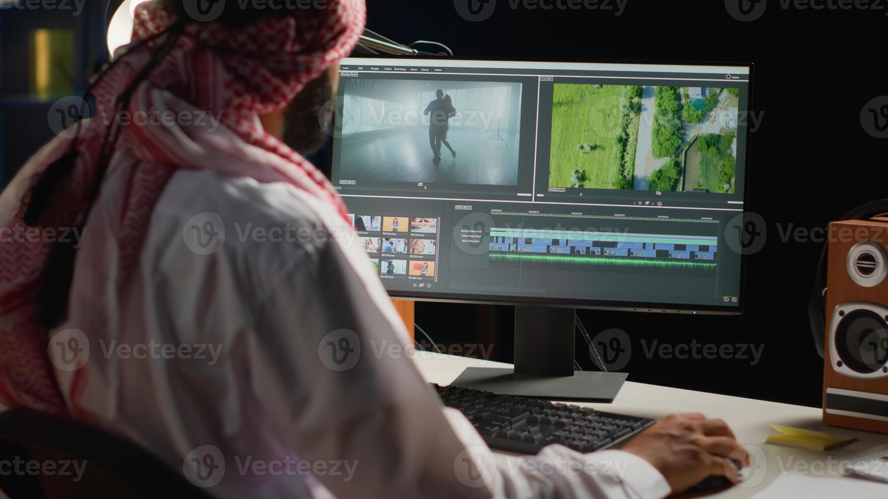 Arabic cinematographer editing new project, creating film montage, working with footage and sound. Man using post production software to process movie on computer workstation photo