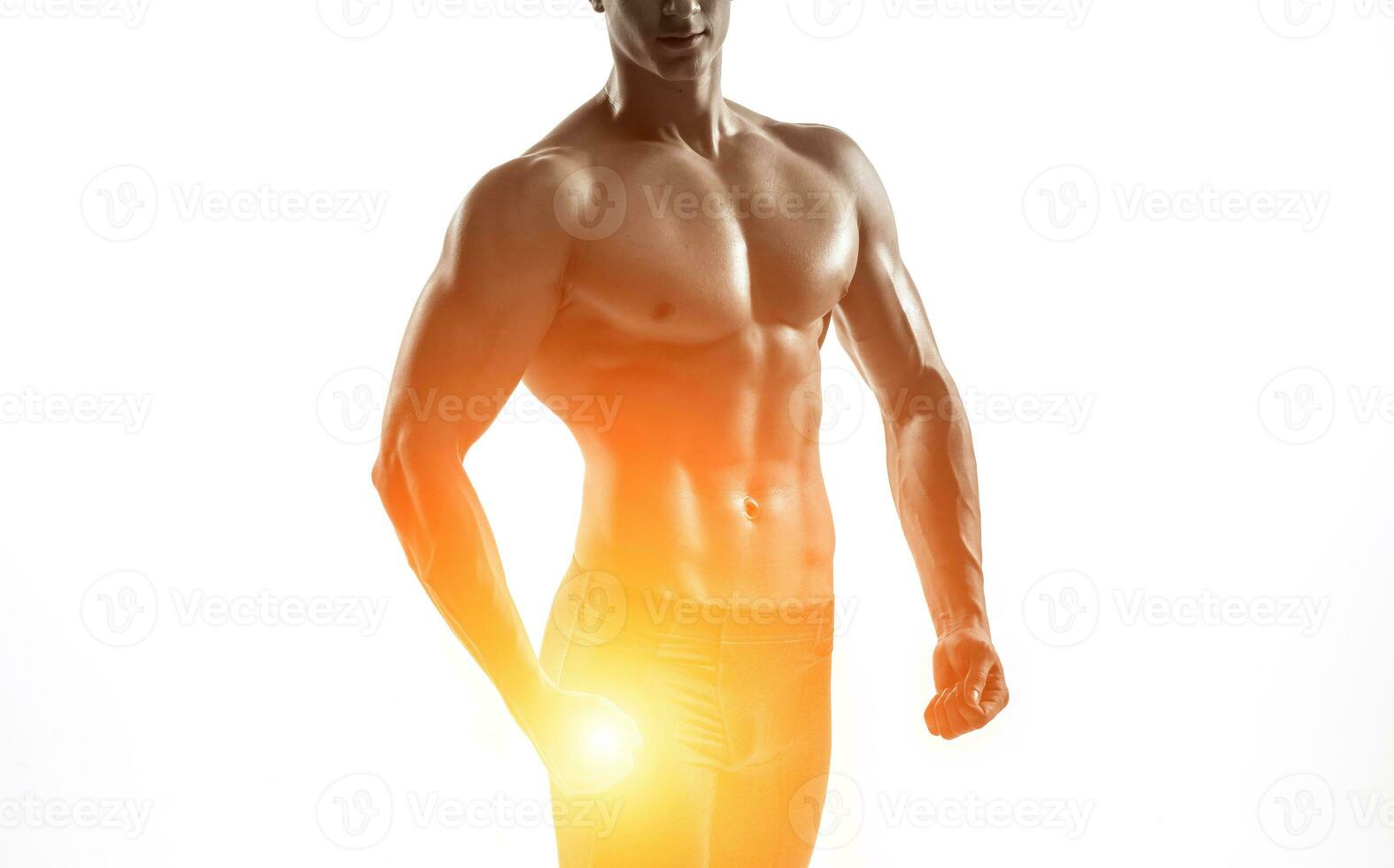 Bodybuilder man posing, showing perfect abs, houlders, biceps, triceps, chest photo
