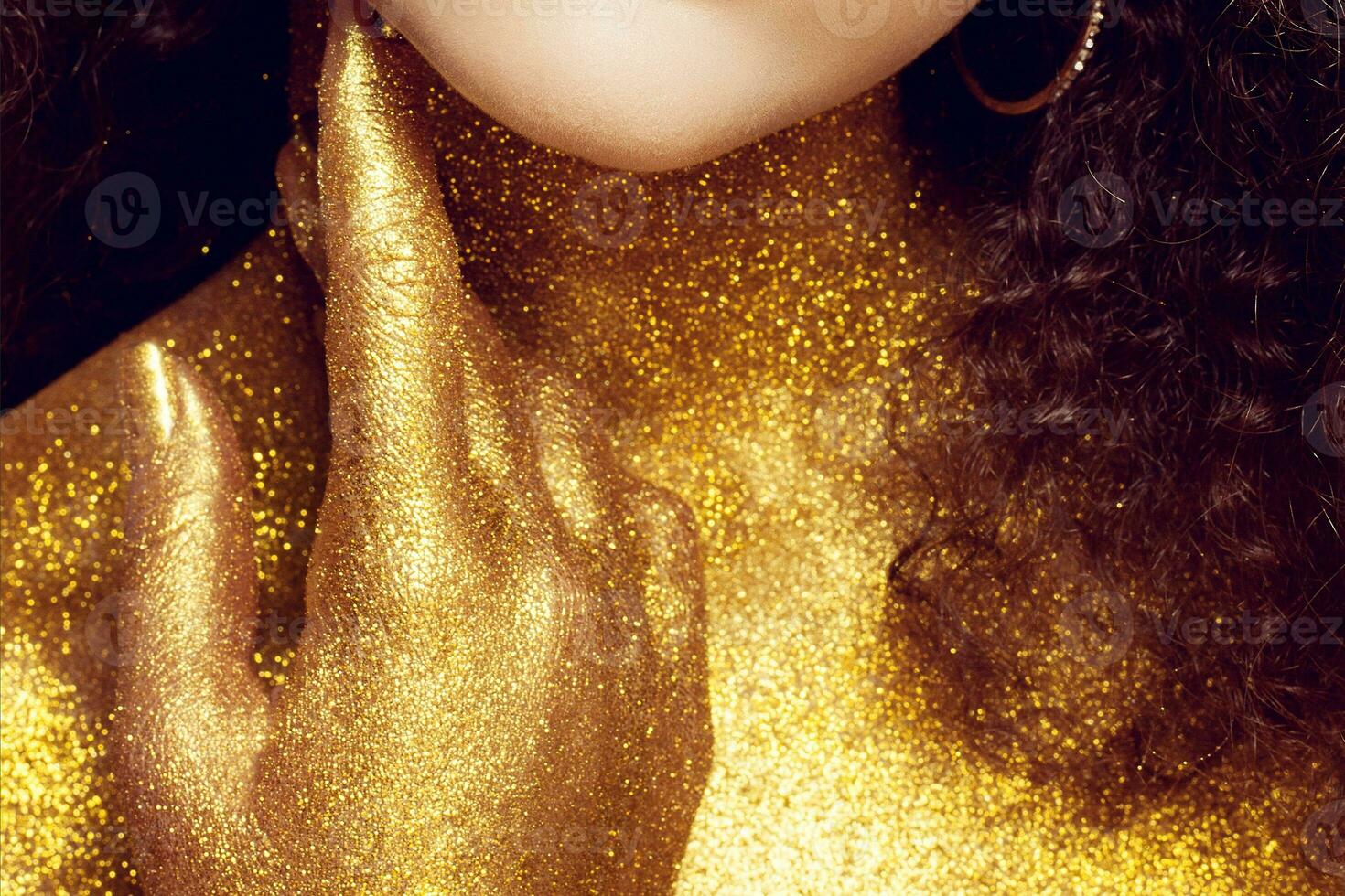 Magic Girl Portrait in Gold. Golden Makeup photo