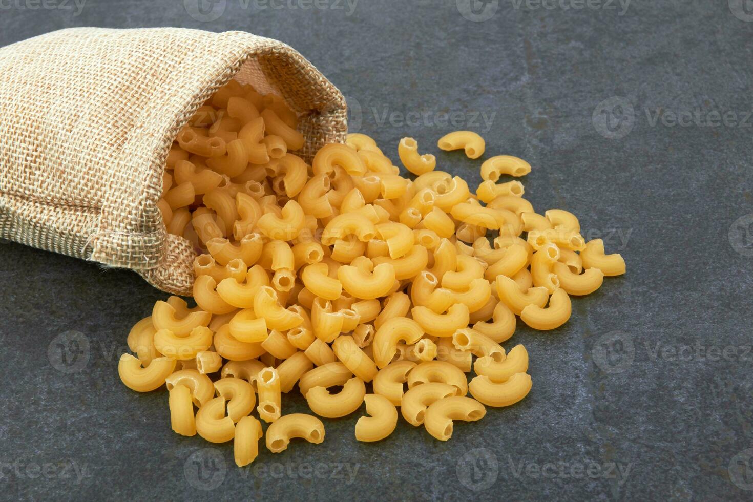 Elbow macaroni in bowl photo