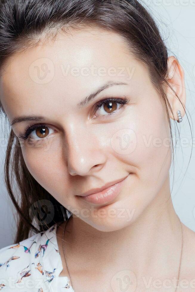 Young woman beauty portrait. Natural soft make up. photo