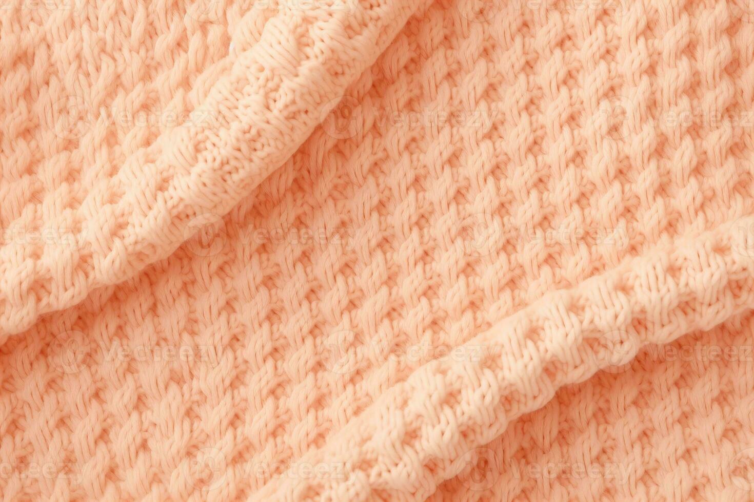 AI generated soft knitted sweater fabric in color of the year 2024 peach fuzz photo