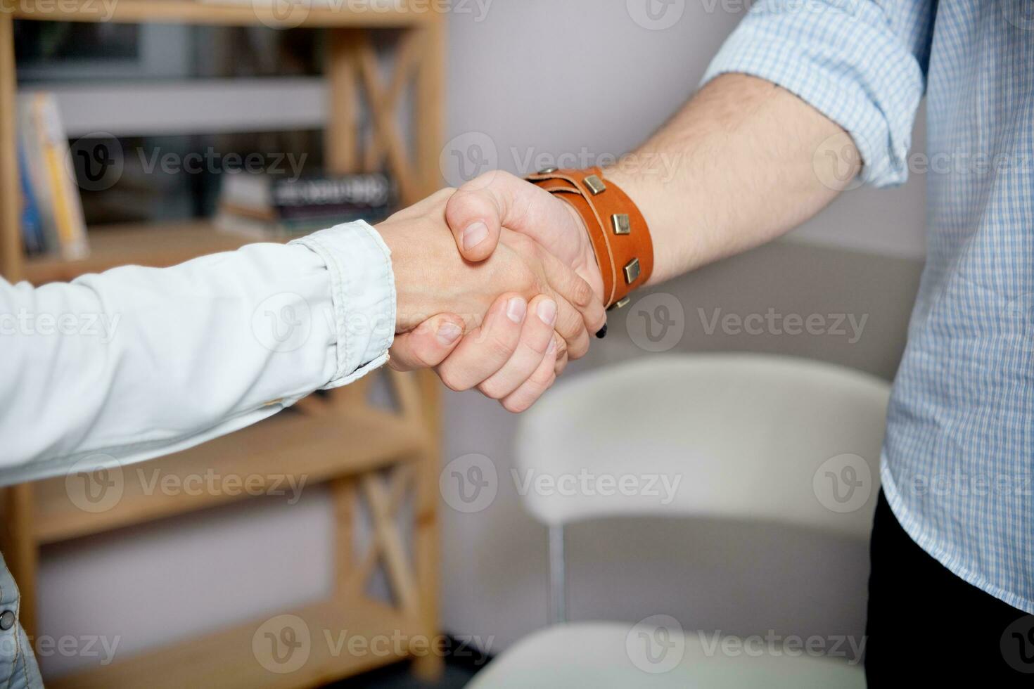 Business people shaking hands in the office photo