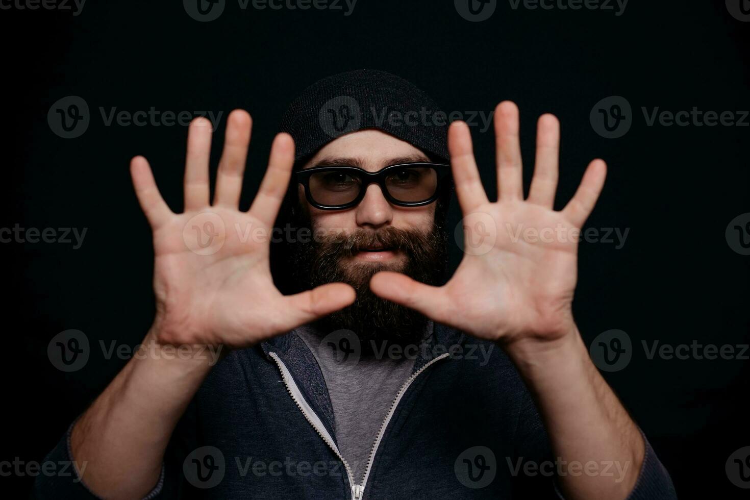 Handsome male big beard in glasses and hat photo