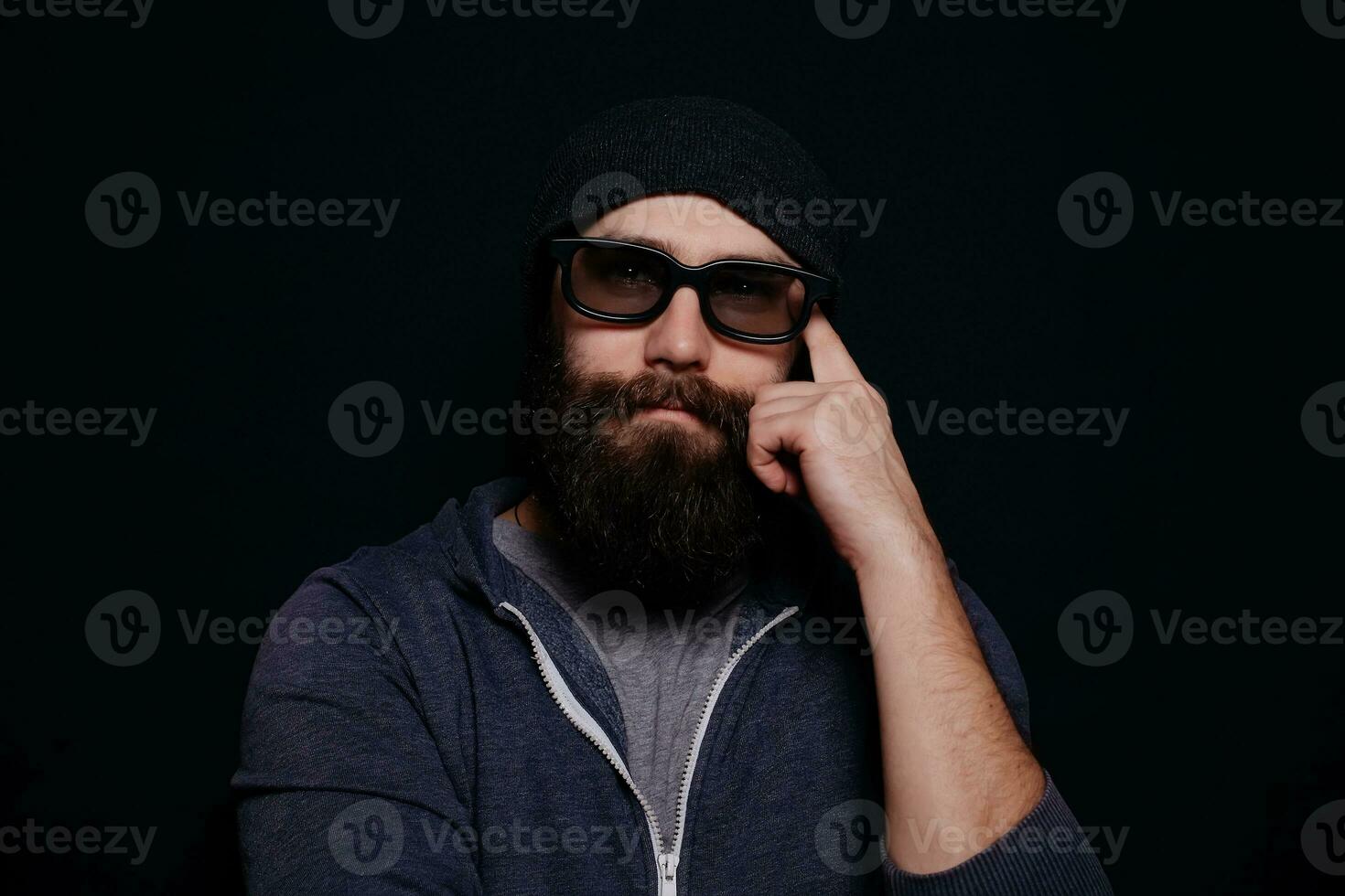 Handsome male big beard in glasses and hat photo