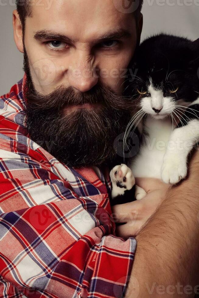 brutal man with cat photo