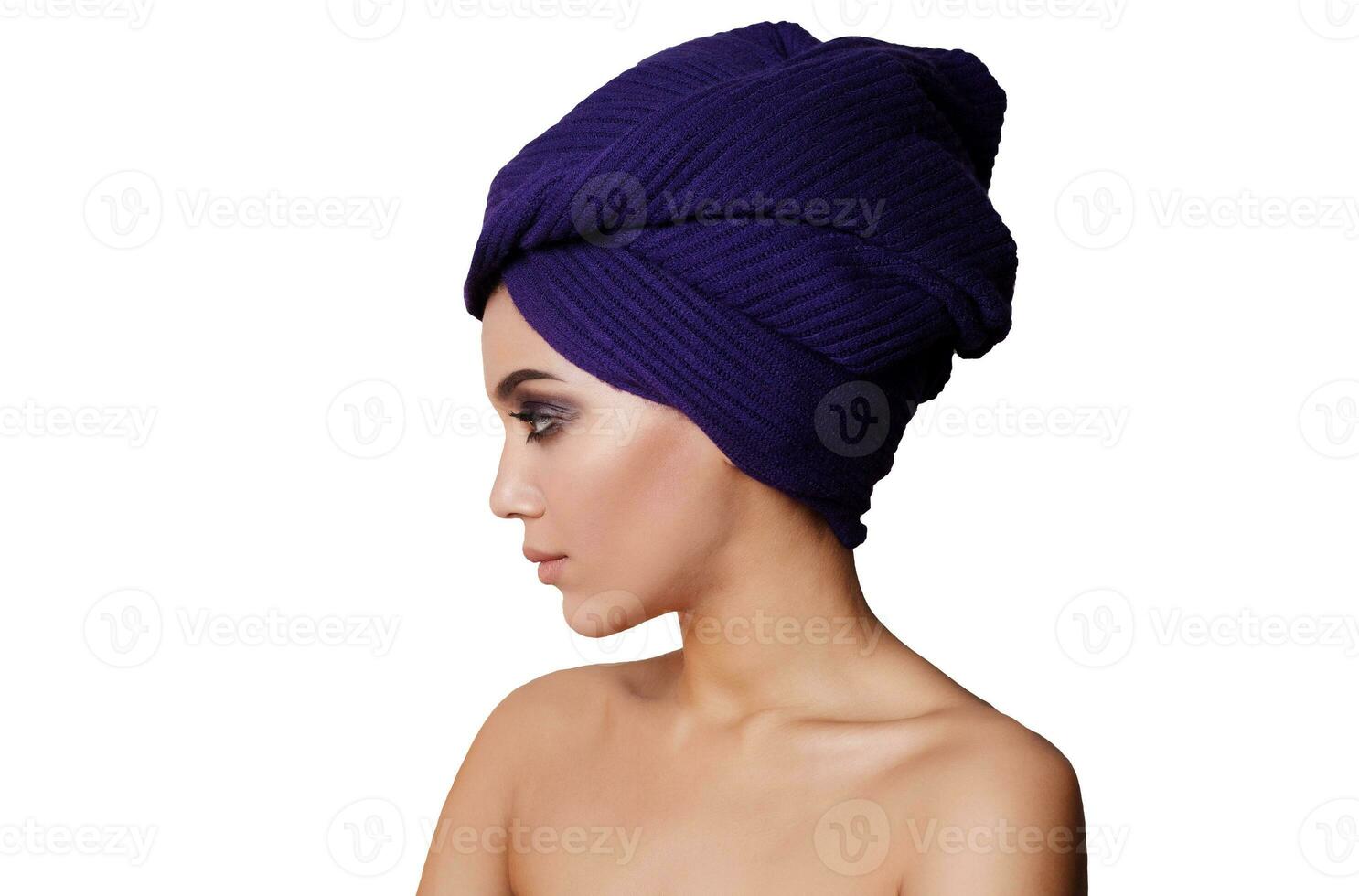 Beautiful african young woman looking outside the picture. Isolated over white background photo