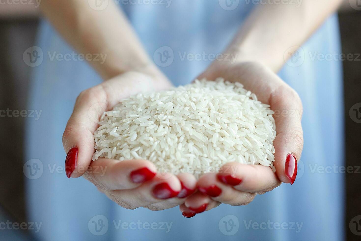 wheat from the palm of her hands. photo