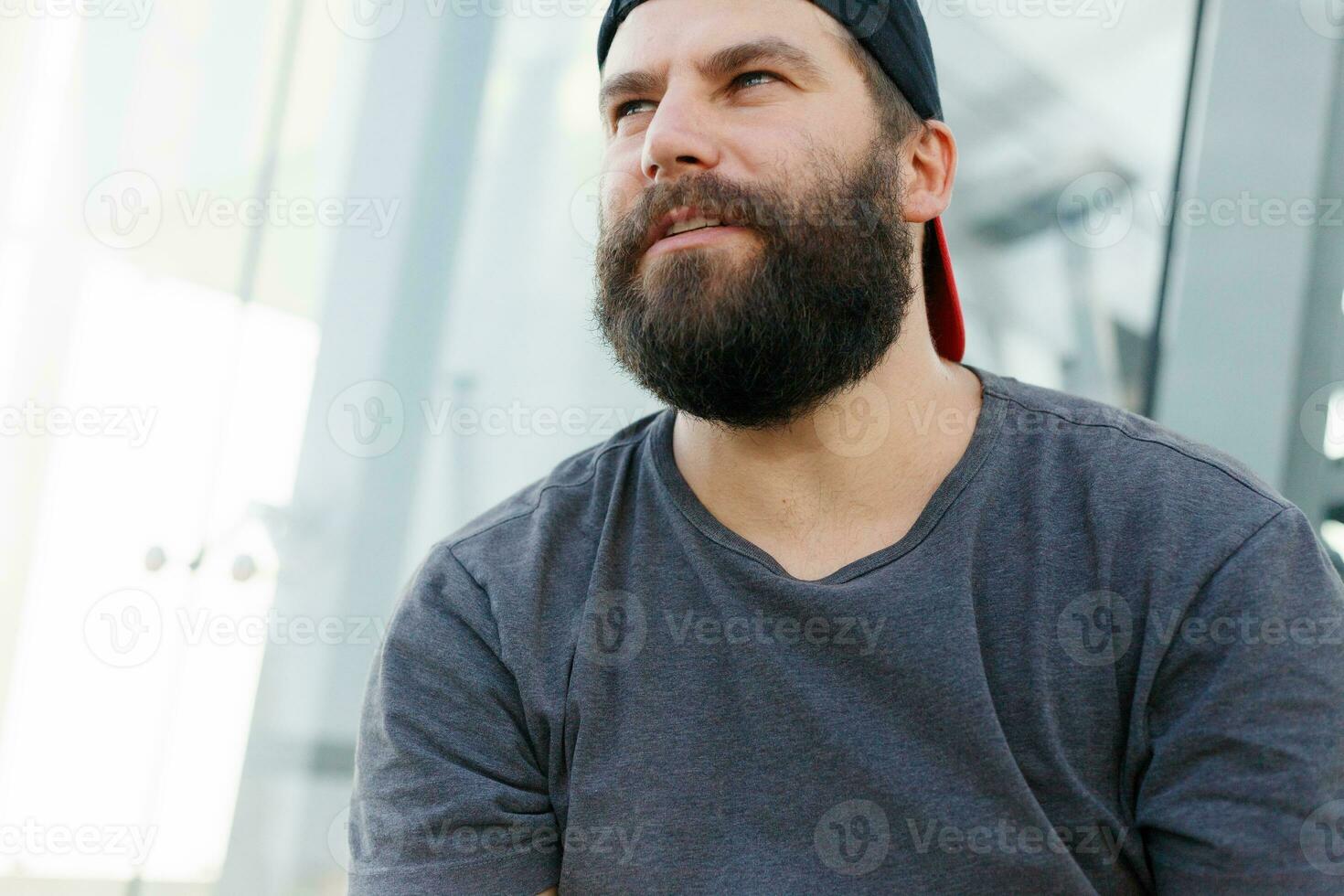 Closeup of smiling young man looking at camera. photo