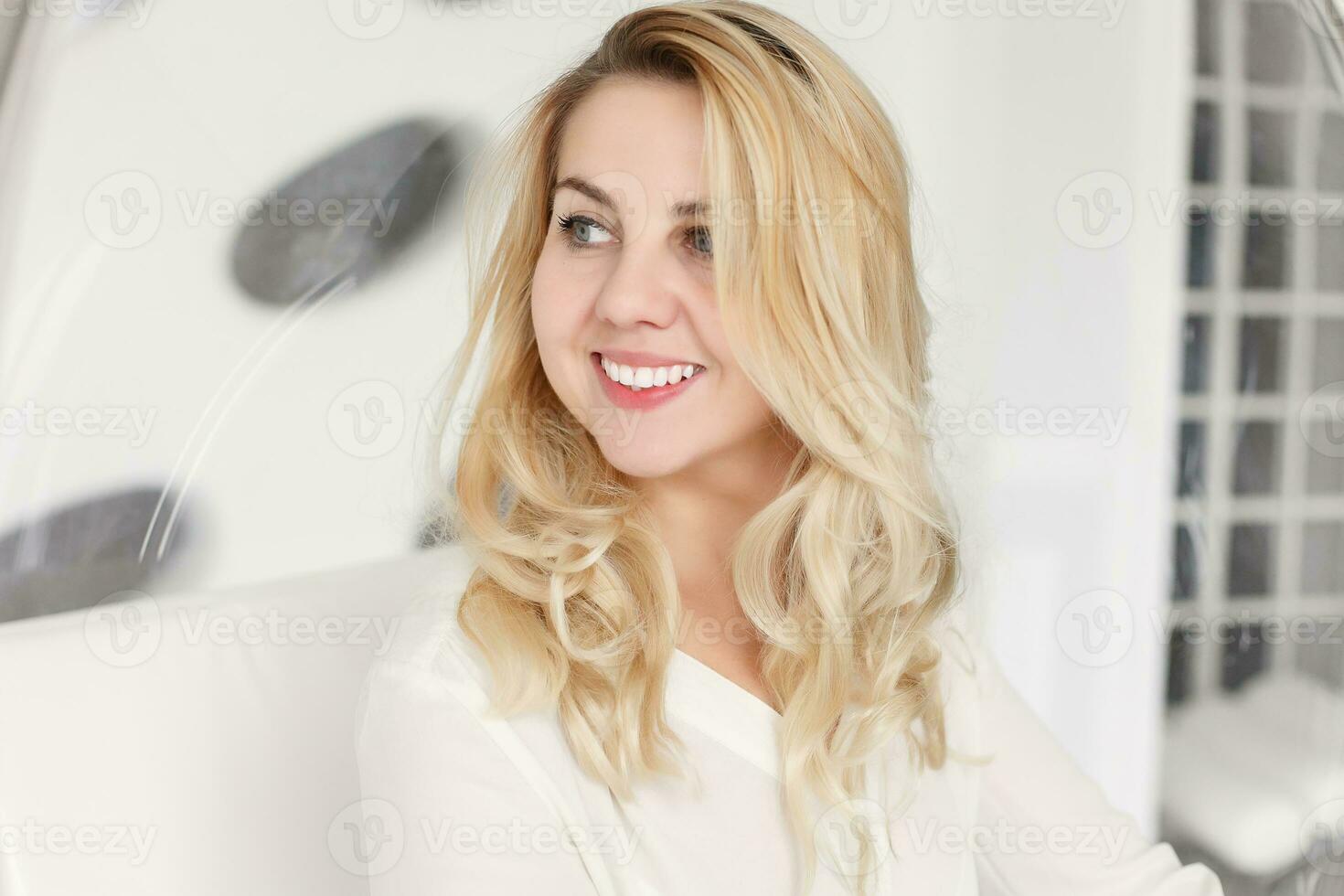 blond girl smiling photo